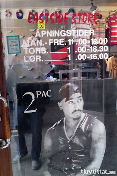2pac, hero of the West Coast, hides in an East Side store...